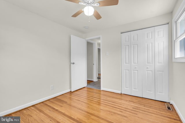 414 Lavender Hill Dr, Cherry Hill, NJ 08003 - unfurnished bedroom featuring light wood-style floors, baseboards, ceiling fan, and a closet