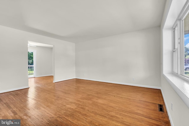 414 Lavender Hill Dr, Cherry Hill, NJ 08003 - empty room with wood finished floors, healthy amount of natural light, and baseboards