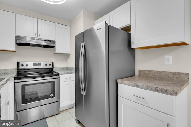 1458 Blockton Ct, Crofton, MD 21114 - kitchen with under cabinet range hood, appliances with stainless steel finishes, white cabinets, and light countertops