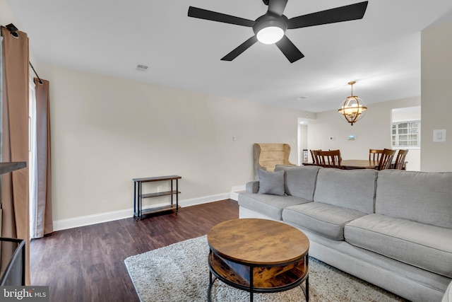 1458 Blockton Ct, Crofton, MD 21114 - living room with dark wood-type flooring, a ceiling fan, and baseboards
