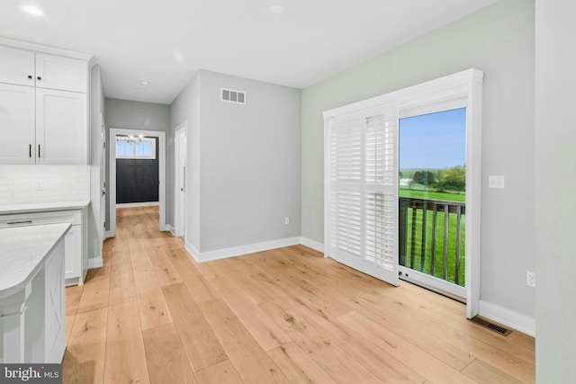 385 Nolf Rd, Nazareth, PA 18064 - unfurnished dining area featuring baseboards, light wood-type flooring, and recessed lighting