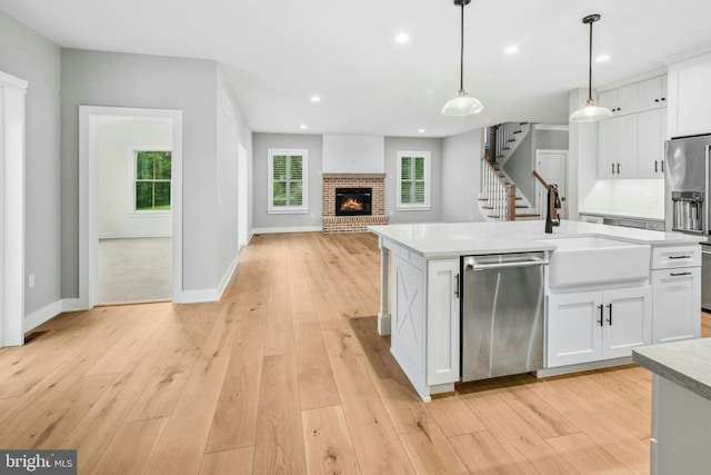 385 Nolf Rd, Nazareth, PA 18064 - kitchen with stainless steel appliances, a sink, plenty of natural light, light countertops, and recessed lighting