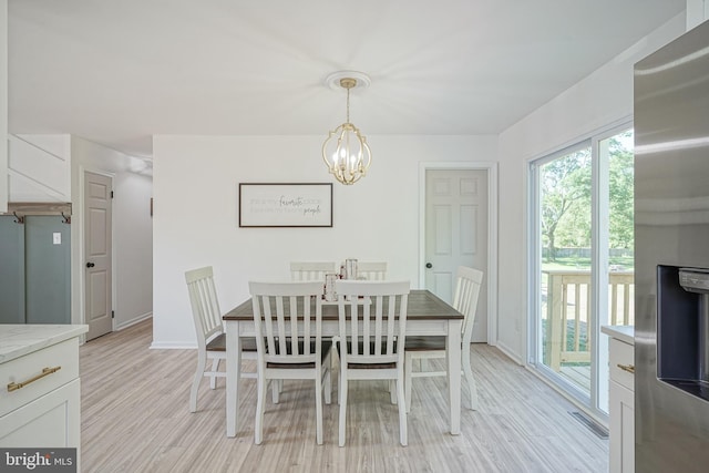 360 N Broad St, Clayton, NJ 08312 - dining area featuring a chandelier, light wood-type flooring, and baseboards