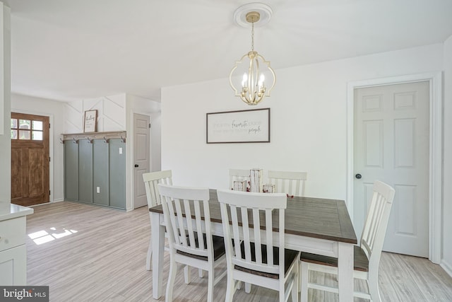 360 N Broad St, Clayton, NJ 08312 - dining room featuring a chandelier and light wood-style flooring