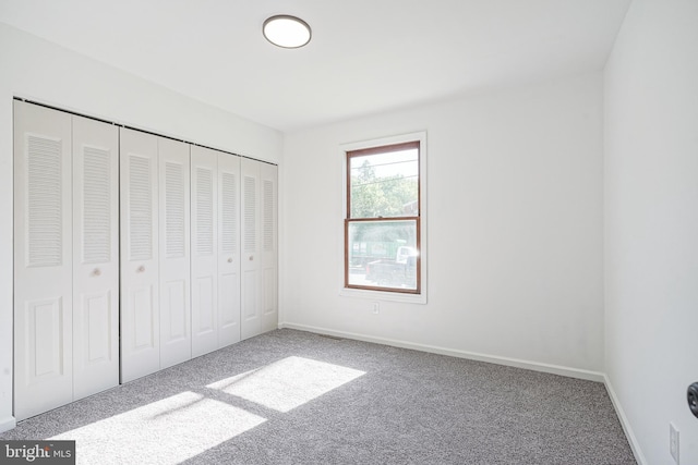 360 N Broad St, Clayton, NJ 08312 - unfurnished bedroom with carpet flooring, baseboards, and a closet