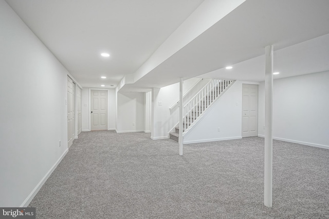 360 N Broad St, Clayton, NJ 08312 - finished below grade area with carpet flooring, recessed lighting, baseboards, and stairs