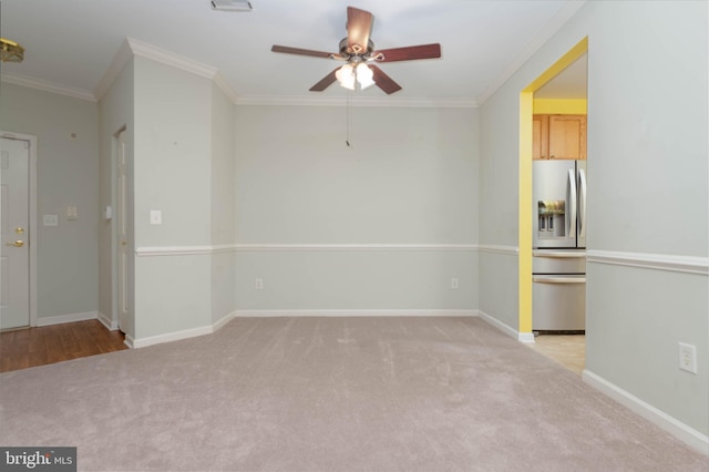 130 W Broadway Unit 1D, Bel Air, MD 21014 - spare room with ceiling fan, light colored carpet, ornamental molding, and baseboards