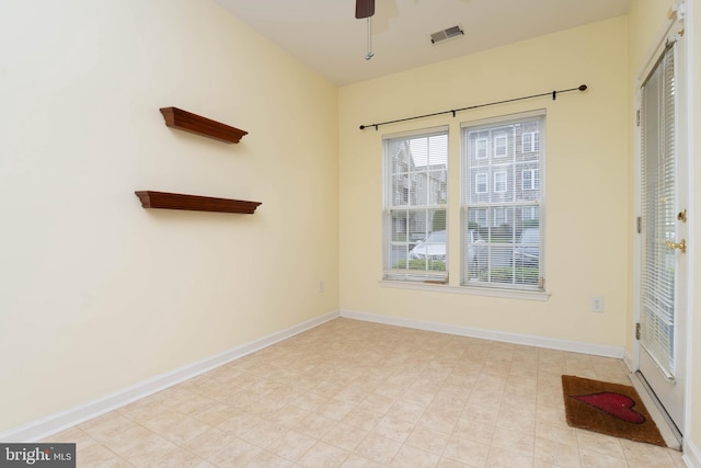 130 W Broadway Unit 1D, Bel Air, MD 21014 - spare room featuring a ceiling fan and baseboards