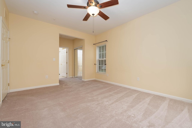 130 W Broadway Unit 1D, Bel Air, MD 21014 - spare room with light colored carpet, ceiling fan, and baseboards