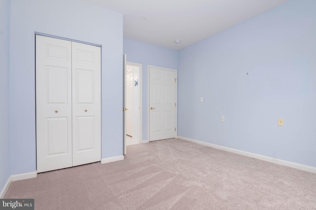 130 W Broadway Unit 1D, Bel Air, MD 21014 - unfurnished bedroom with carpet floors, a closet, and baseboards