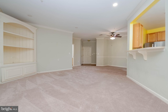 130 W Broadway Unit 1D, Bel Air, MD 21014 - unfurnished living room featuring a ceiling fan, crown molding, light colored carpet, and baseboards