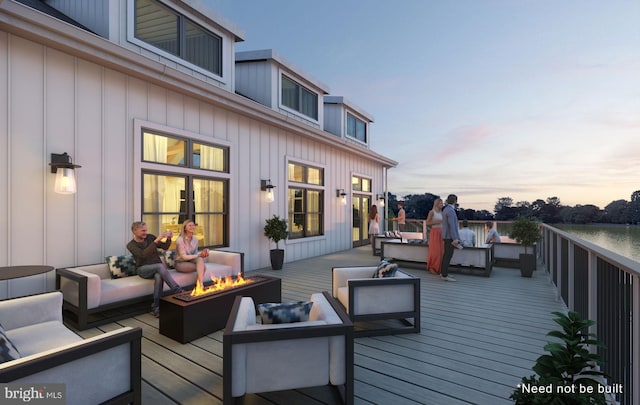 36534 Burleson Dr, Frankford, DE 19945 - deck at dusk featuring an outdoor living space with a fire pit