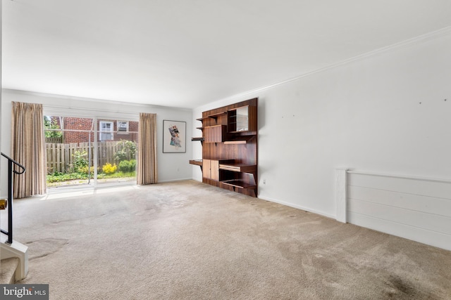 15 Llanfair Rd Unit B, Ardmore, PA 19003 - unfurnished living room with carpet and baseboards