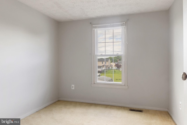 30 Towns Ct, Baltimore, MD 21237 - carpeted spare room featuring a textured ceiling and baseboards