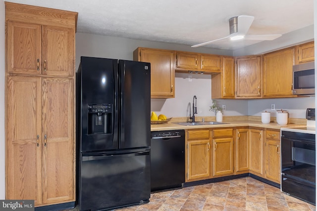 30 Towns Ct, Baltimore, MD 21237 - kitchen with black appliances, a sink, light countertops, ceiling fan, and stone finish floors