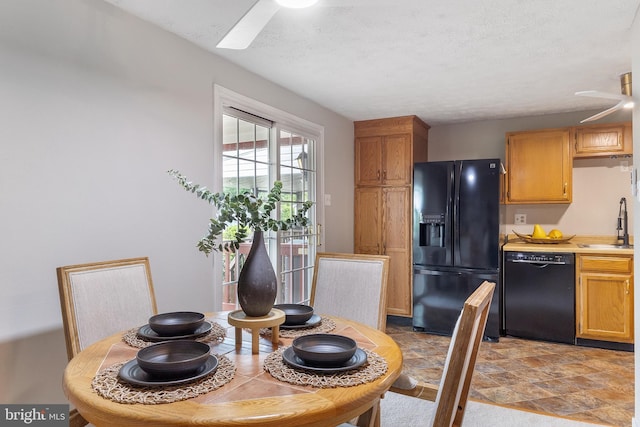 30 Towns Ct, Baltimore, MD 21237 - dining area with ceiling fan, stone finish floors, and a textured ceiling