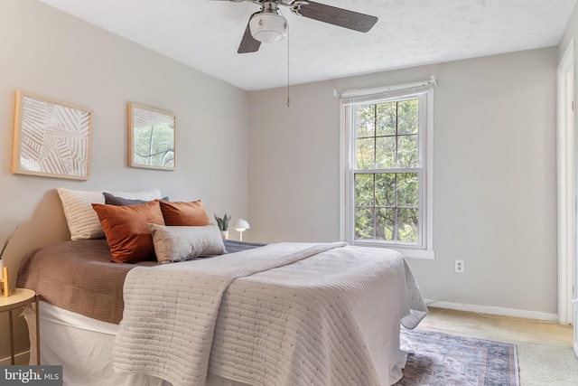 30 Towns Ct, Baltimore, MD 21237 - carpeted bedroom with baseboards and a ceiling fan