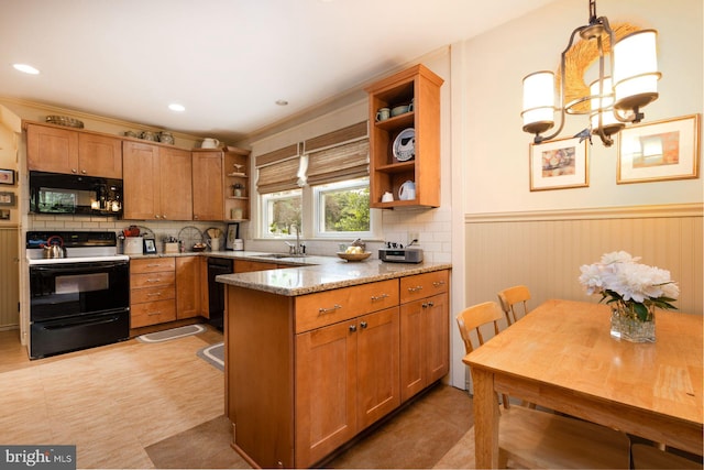 550 Somerton Ave, Philadelphia, PA 19116 - kitchen with black appliances, open shelves, a sink, wainscoting, and brown cabinets