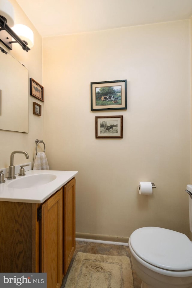 550 Somerton Ave, Philadelphia, PA 19116 - bathroom with toilet, vanity, and baseboards