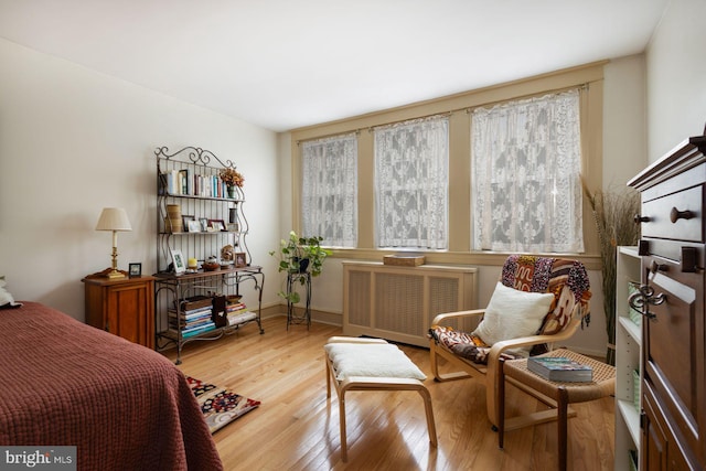 550 Somerton Ave, Philadelphia, PA 19116 - bedroom with radiator, wood finished floors, and baseboards