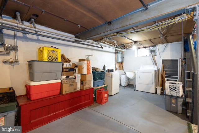 550 Somerton Ave, Philadelphia, PA 19116 - basement featuring washing machine and clothes dryer, refrigerator, and electric panel