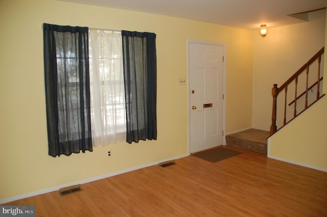 404 Franklin Ct, North Wales, PA 19454 - entryway featuring wood finished floors, stairway, and baseboards