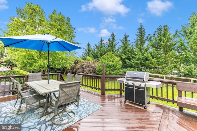 10226 Tarpley Ct, Ellicott City, MD 21042 - wooden deck with a grill and outdoor dining space