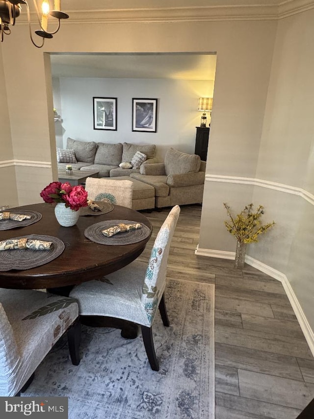 1004 Blackwell, Annapolis, MD 21403 - dining room with wood finished floors, baseboards, a chandelier, and ornamental molding