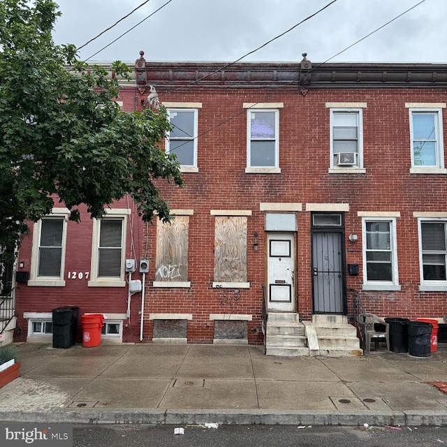 1207 Liberty, Camden, NJ 08103 - townhome / multi-family property featuring entry steps, brick siding, and cooling unit