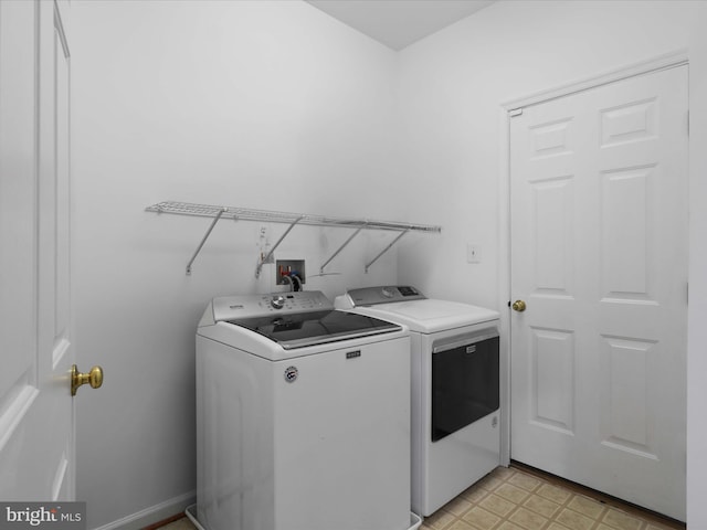 9499 Ballagan Ct, Bristow, VA 20136 - laundry room featuring washing machine and dryer and light floors
