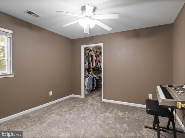 9499 Ballagan Ct, Bristow, VA 20136 - carpeted office space featuring a ceiling fan and baseboards
