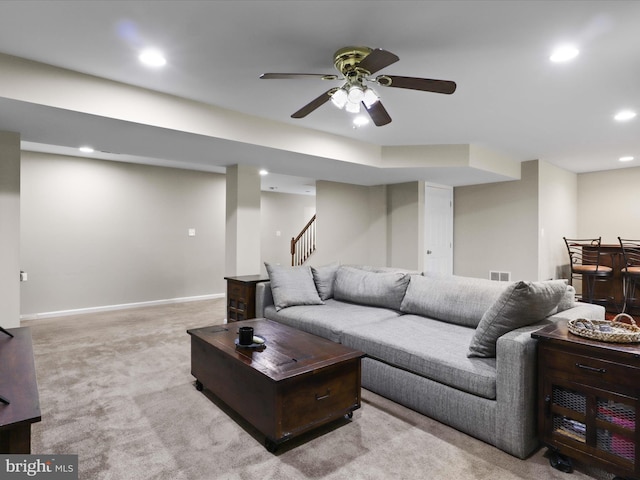 9499 Ballagan Ct, Bristow, VA 20136 - living area with recessed lighting, carpet floors, stairs, ceiling fan, and baseboards