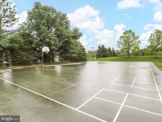 9499 Ballagan Ct, Bristow, VA 20136 - view of basketball court featuring community basketball court, view of wooded area, and a yard