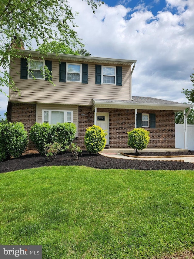 9117 Summer Park Dr, Baltimore, MD 21234 - view of front of home with a front lawn and brick siding