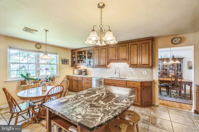 221 Shirley, Jeffersonville, PA 19403 - kitchen with a chandelier, a sink, brown cabinets, and dishwasher