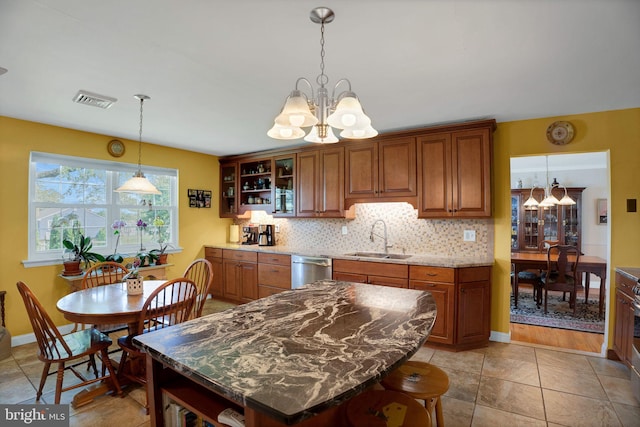 221 Shirley, Jeffersonville, PA 19403 - kitchen featuring a chandelier, a sink, open shelves, dishwasher, and decorative backsplash