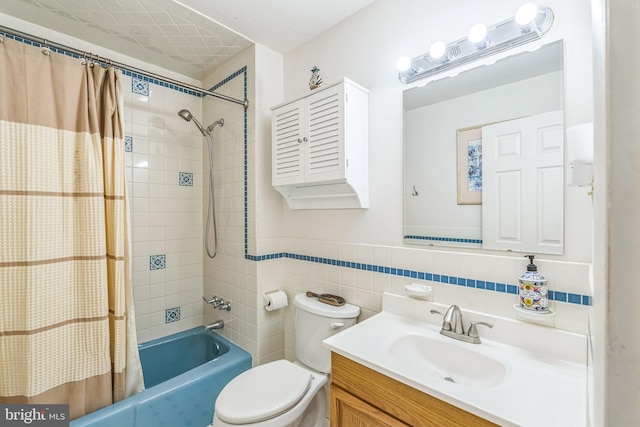221 Shirley, Jeffersonville, PA 19403 - full bathroom featuring tile walls, shower / bathtub combination with curtain, vanity, toilet, and wainscoting