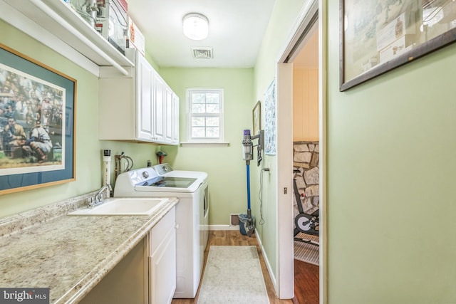 221 Shirley, Jeffersonville, PA 19403 - washroom with cabinet space, independent washer and dryer, light wood-type flooring, and baseboards