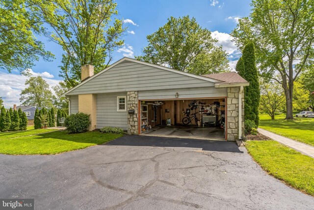 221 Shirley, Jeffersonville, PA 19403 - view of property exterior featuring a chimney, driveway, a lawn, and stone siding