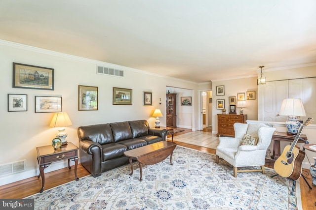 221 Shirley, Jeffersonville, PA 19403 - living area with crown molding, wood finished floors, and baseboards