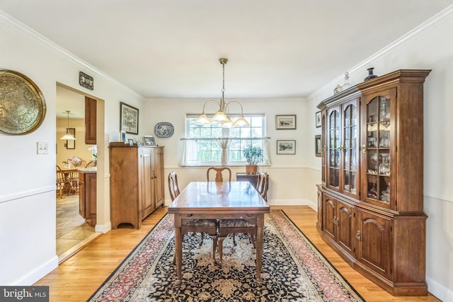 221 Shirley, Jeffersonville, PA 19403 - dining area with light wood-style floors, crown molding, and a chandelier