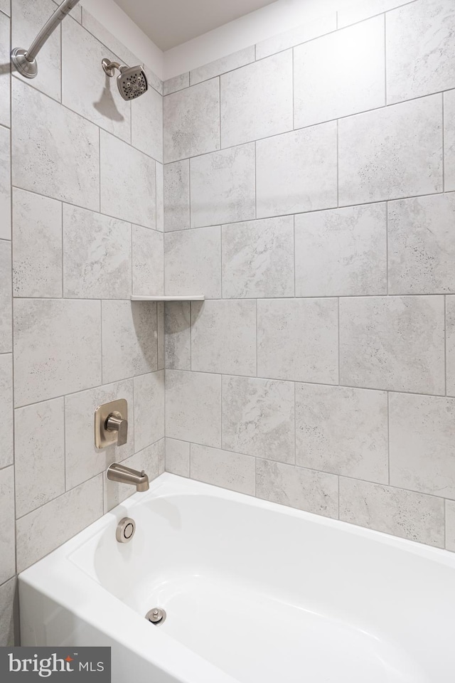 bathroom featuring bathing tub / shower combination