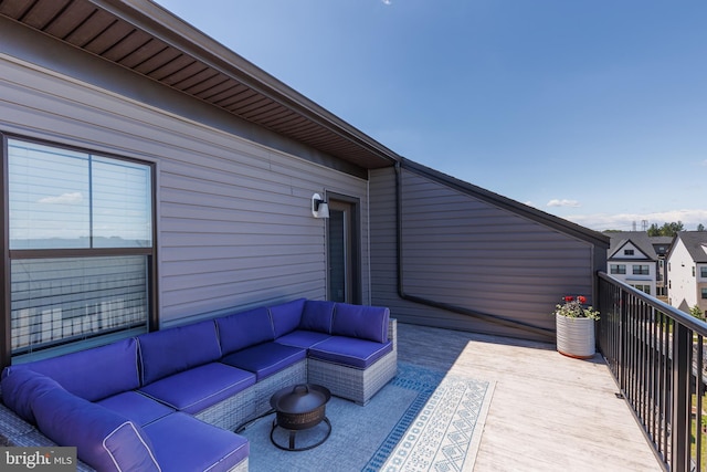wooden deck featuring outdoor lounge area
