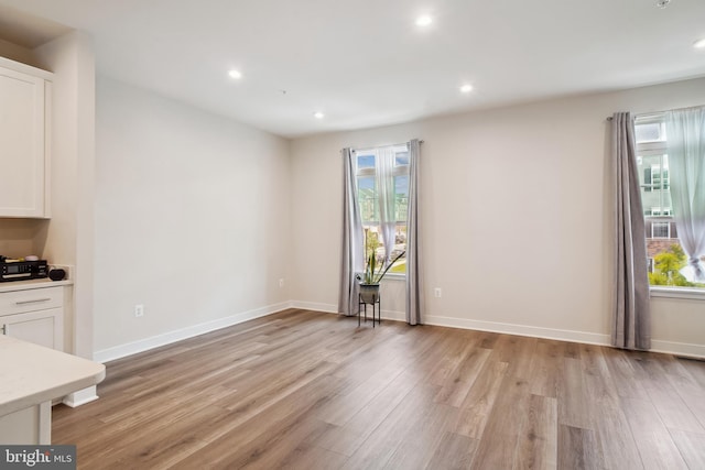 1724 Atlas Dr, Frederick, MD 21702 - unfurnished living room featuring light wood finished floors, recessed lighting, and baseboards