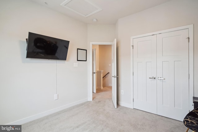 1724 Atlas Dr, Frederick, MD 21702 - unfurnished bedroom featuring light carpet, attic access, baseboards, and a closet