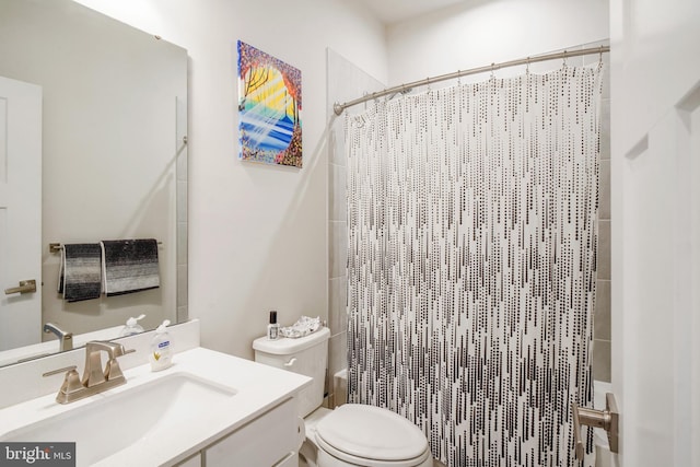 1724 Atlas Dr, Frederick, MD 21702 - bathroom featuring vanity, a shower with shower curtain, and toilet
