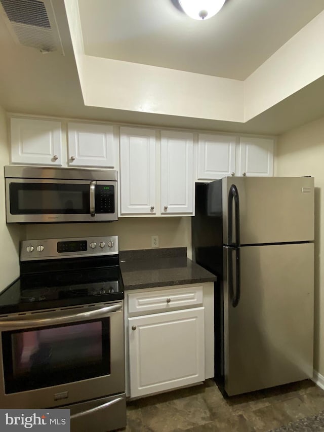 18318 Streamside Dr Unit 203, Gaithersburg, MD 20879 - kitchen with appliances with stainless steel finishes and white cabinets