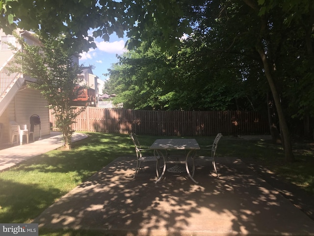 view of patio featuring outdoor dining space