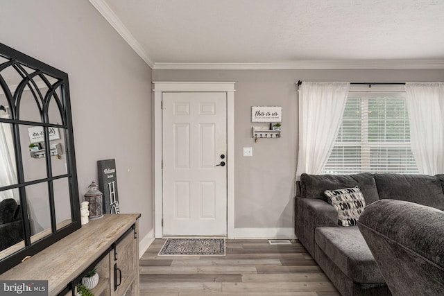 16155 Kerby Dr, Orange, VA 22960 - foyer featuring light wood finished floors, ornamental molding, and baseboards