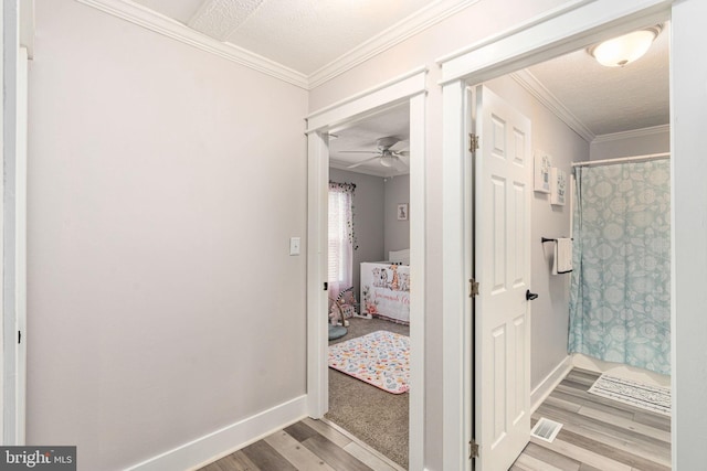 16155 Kerby Dr, Orange, VA 22960 - full bath featuring wood finished floors, a ceiling fan, a shower with shower curtain, baseboards, and ornamental molding